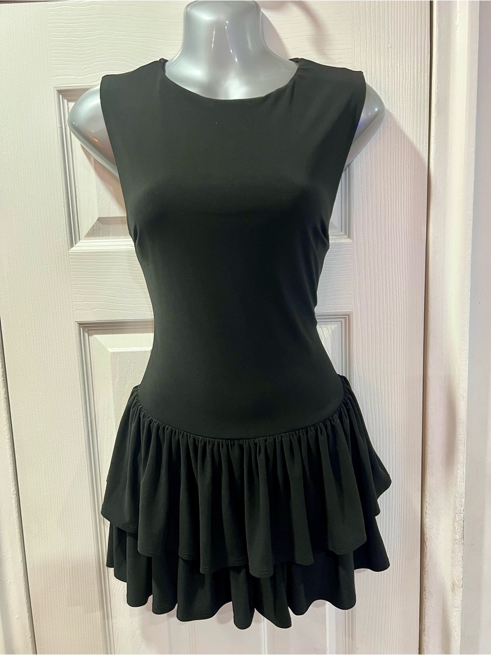 Black Sleeveless Ruffle-Hem Romper